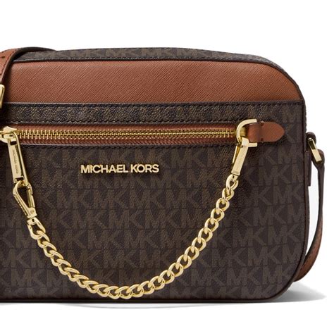 michael kors logo drawstring large crossbody brown|Michael Kors brown crossbody bag.